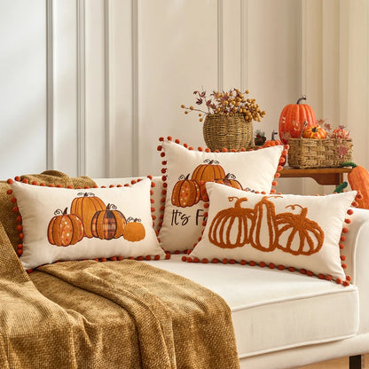 Tufted pumpkin fall pillow covers on a sofa