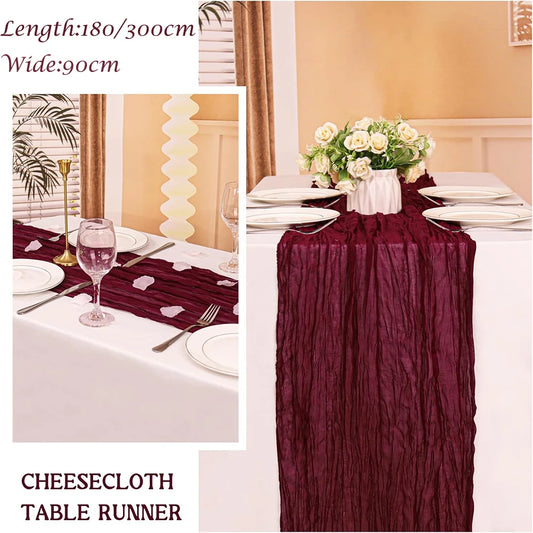 Burgundy cheesecloth runner on a dinner table