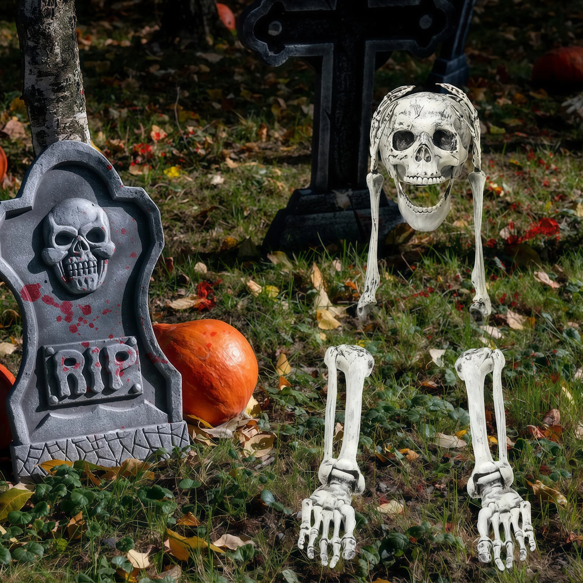 Skull and bones with pumpkin and tombstone