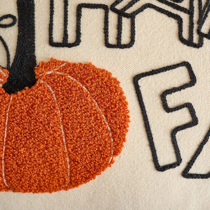 Tufted pumpkin embroidery close-up