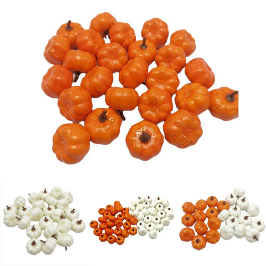 Mini artificial pumpkins in orange and white