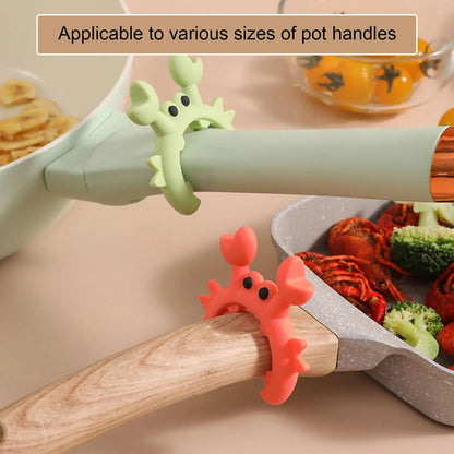 Silicone crab spoon holder on stovetop