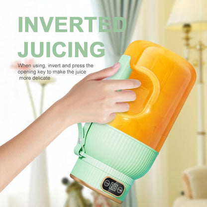 Portable blender making a fruit smoothie